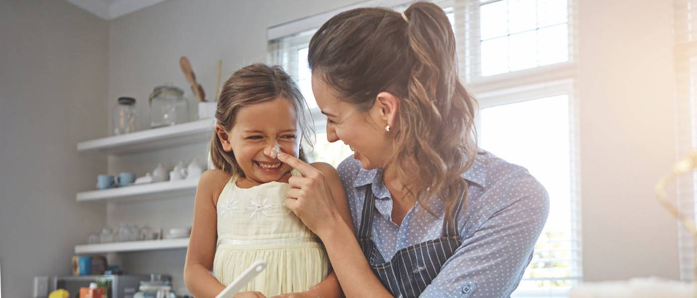 Mother and daughter cooking