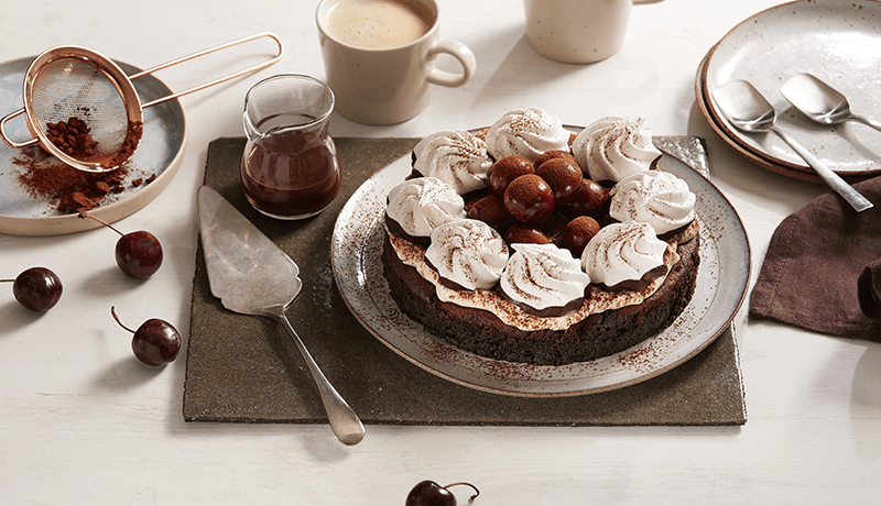 Chocolate Cherry Torte with Meringue Swirls