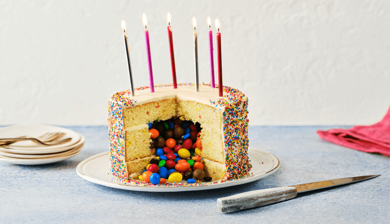 Rainbow piñata cake